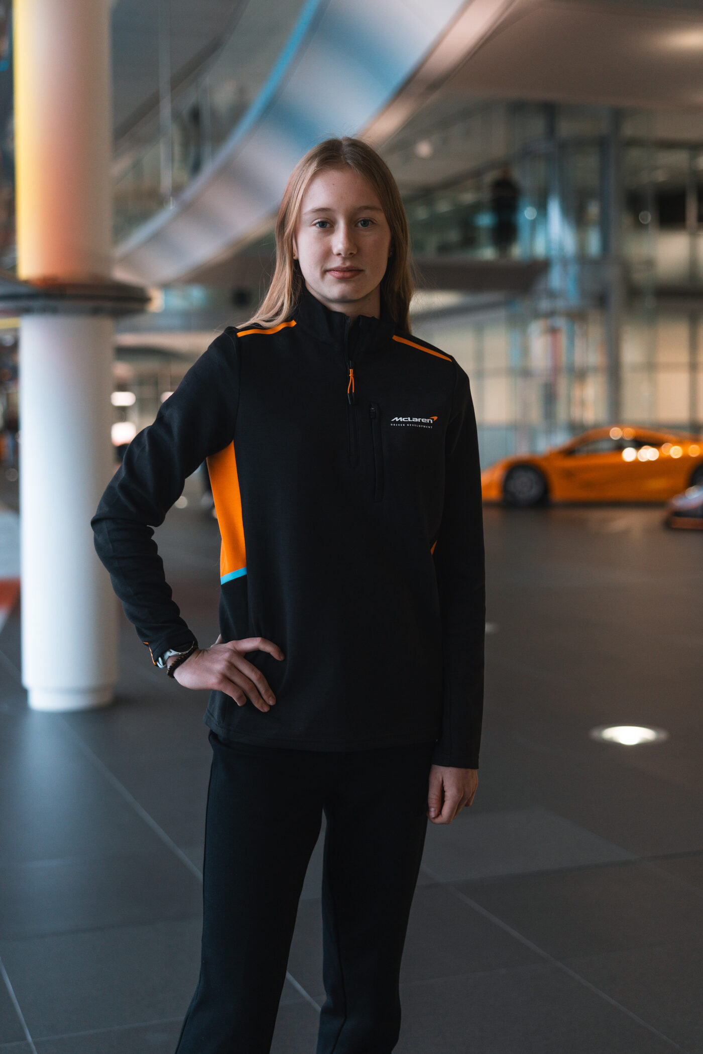 Ella Häkkinen in McLaren team wear at the McLaren Technology Centre