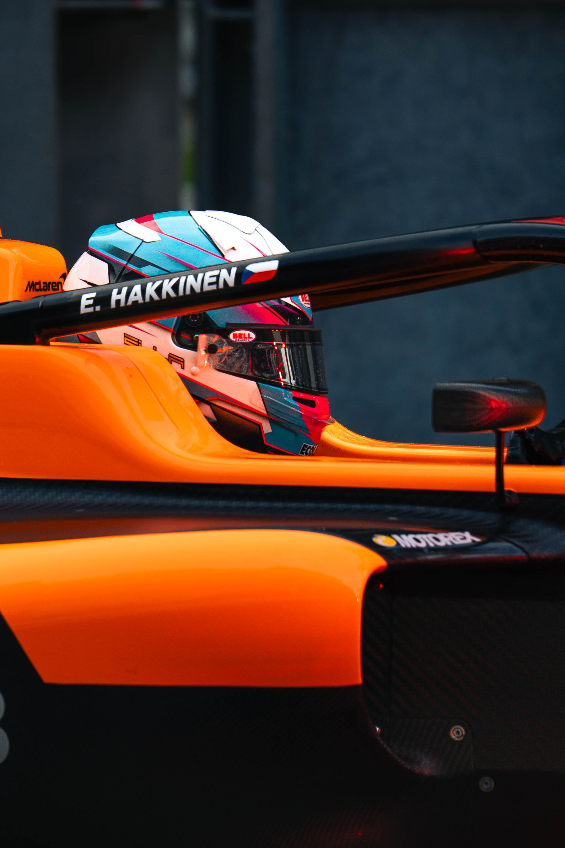 Ella Häkkinen's helmet in her McLaren-orange Formula 4 car